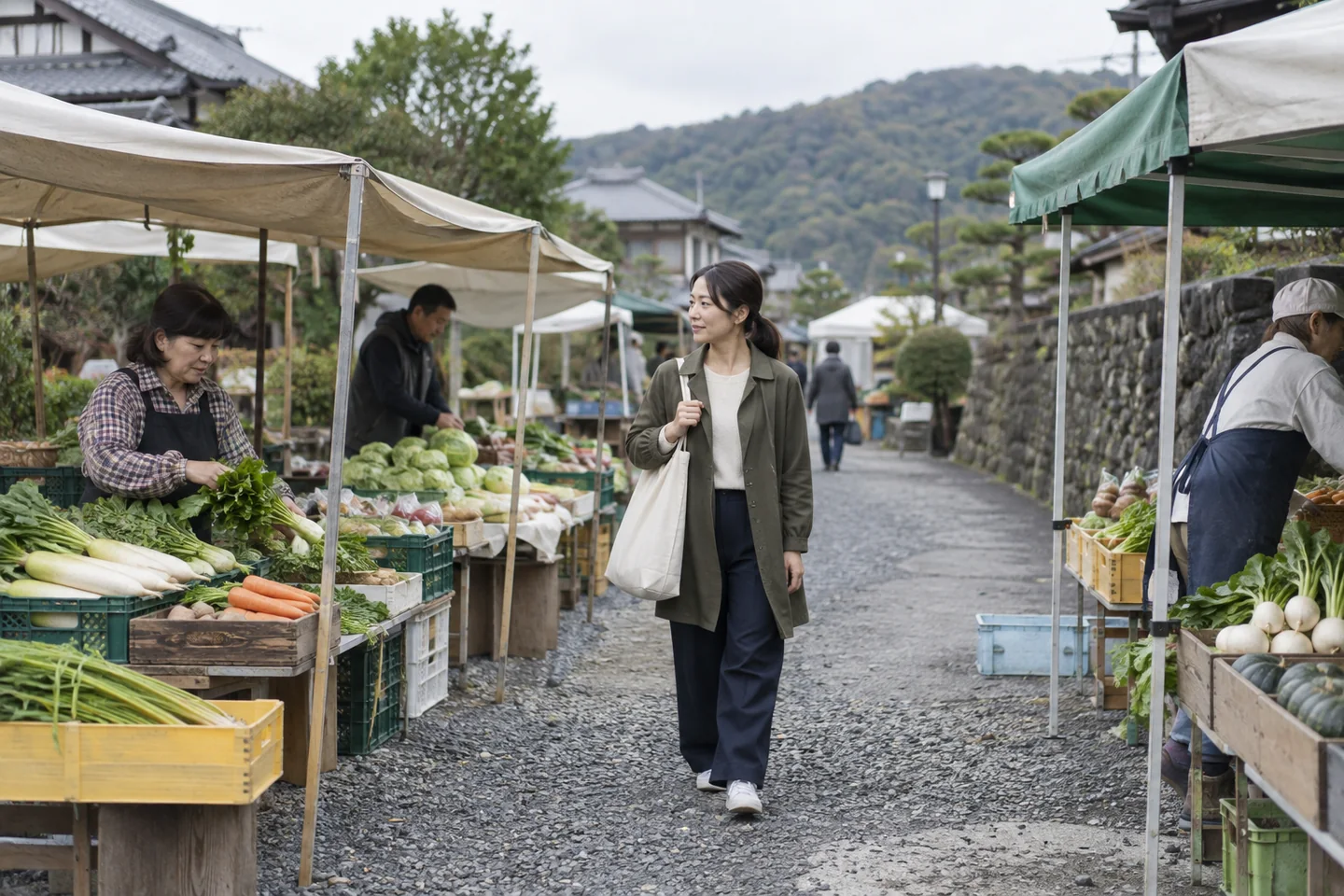 An adult carries a plain cloth bag through a quiet vegetable market